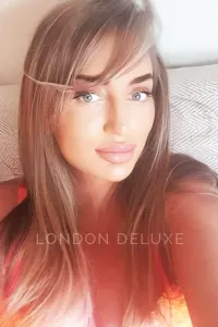 Selfie of London escort Anna wearing pink lingerie
